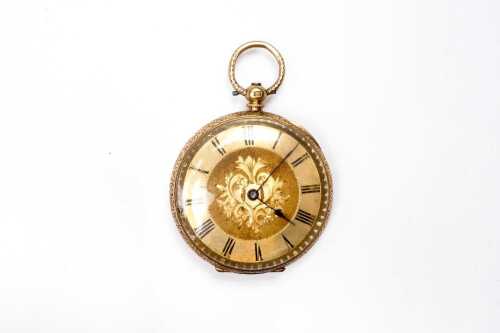 An antique pocket watch in 18 carat yellow gold