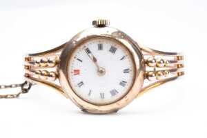 An antique ladies bangle watch in 9 carat yellow gold. - 2