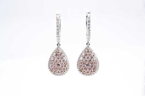 A pair of pink and white diamond drop earrings in 18 carat white and rose gold