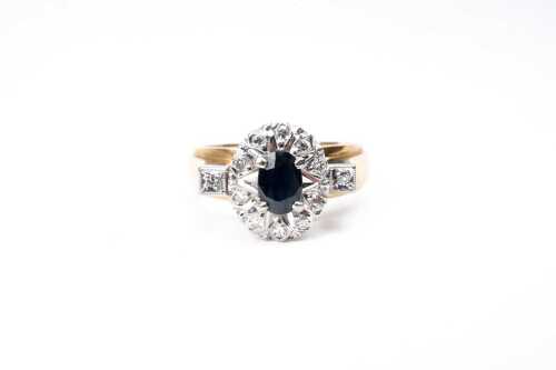 A vintage sapphire and diamond ring in 18 carat and platinum