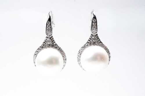 A pair of South Sea pearl and diamond drop earrings in 14 carat white gold