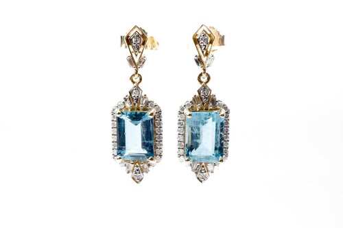 A pair of aquamarine and diamond earrings in 14 carat white gold