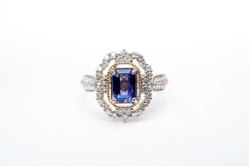 A tanzanite and diamond ring in 14 carat yellow gold