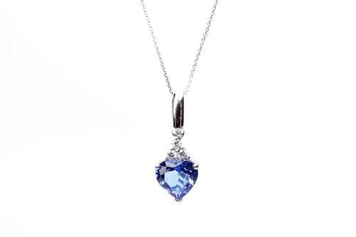 A tanzanite and diamond pendant and necklace in 14ct white gold