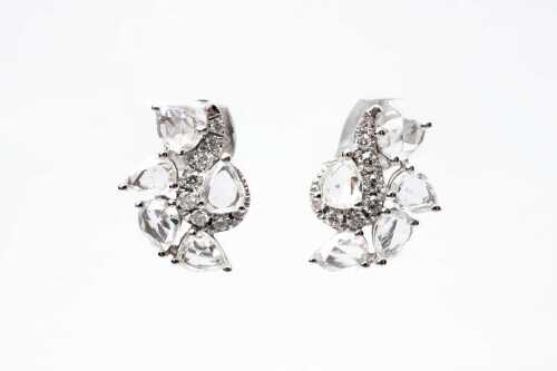 A pair of diamond earrings in 18 carat white gold