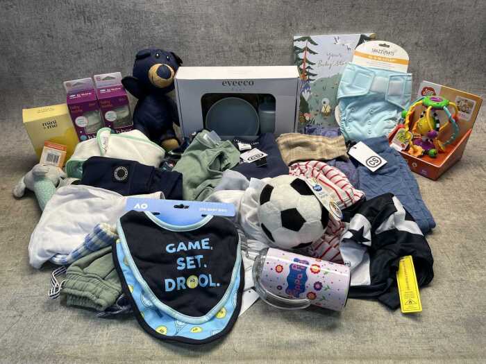 Group of baby boy clothing and accessories