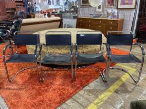Set of four cantilever armchairs