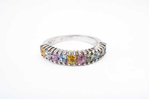 A multi coloured sapphire ring in 14 carat white gold