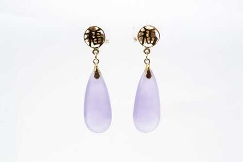 A pair of lavender jade earrings in 14 carat yellow gold