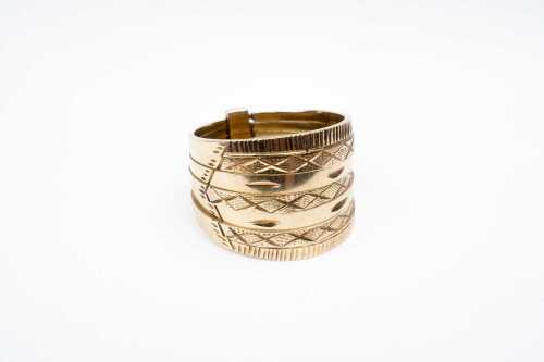 A seven ring set in 14 carat yellow gold