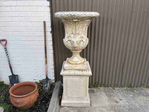 Classical style concrete urn on pedestal