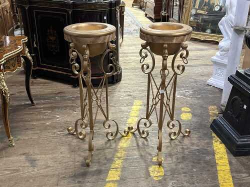 Pair of gold painted bowls on wrought iron stands