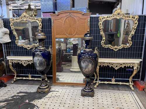 Pair of Rococo style consoles and mirrors