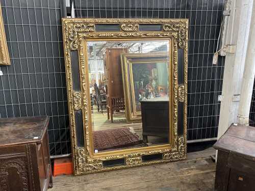 Gilt framed bevelled edge wall mirror