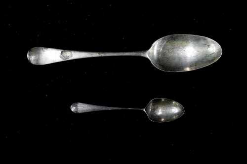 Two 18th century English sterling silver fancy back Hanoverian spoons