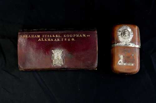 Antique Dutch leather pocketbook with silver-tone mount, together with a leather cigar case