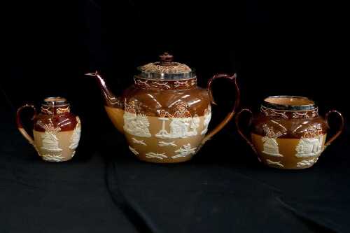 Antique sterling silver mounted Doulton Lambeth salt glazed stoneware tea service