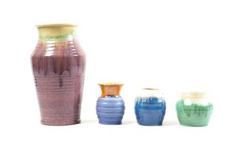 Four Remued drip glaze pottery vases