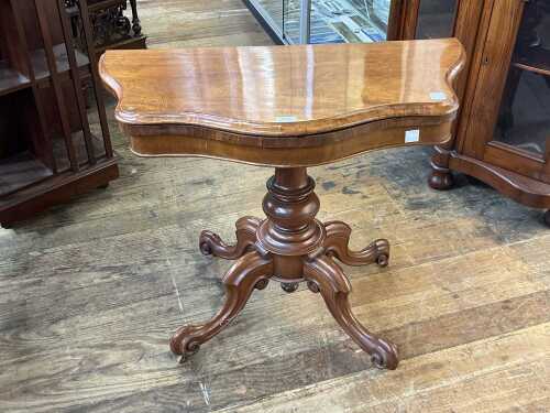 Late Victorian walnut serpentine card table