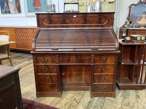 19th century Biedermeier flame mahogany roll top desk