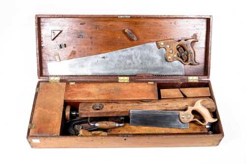 Vintage carpenter's timber toolbox with assorted tools