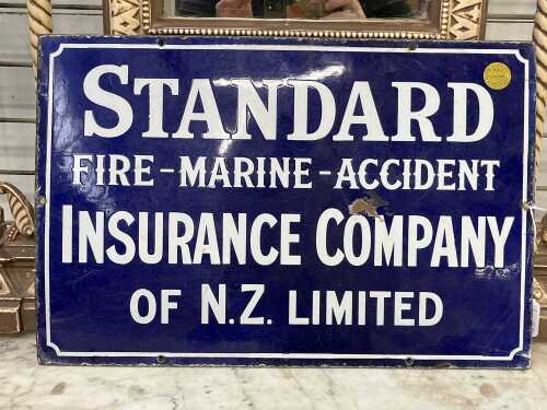 Vintage Standard Insurance Company of N.Z. Limited blue and white enamel sign