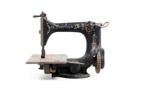 Antique Singer 24-57 miniature sewing machine