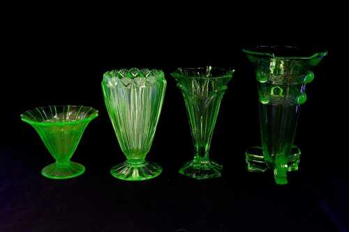 Four Art Deco uranium glass vases