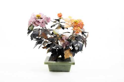 Oriental carved stone peony bonsai tree