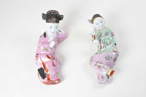 Two antique Chinese Famille Rose hand painted porcelain reclining figures