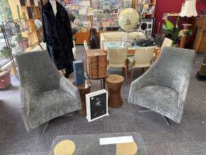 Pair of Arthur G Luna Swivel Chairs