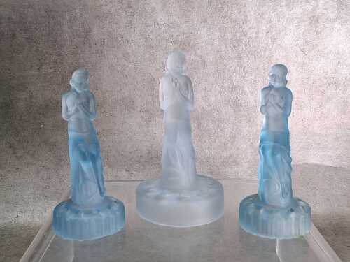 88 · Three Art-deco blue frosted glass lady centrepiece figures