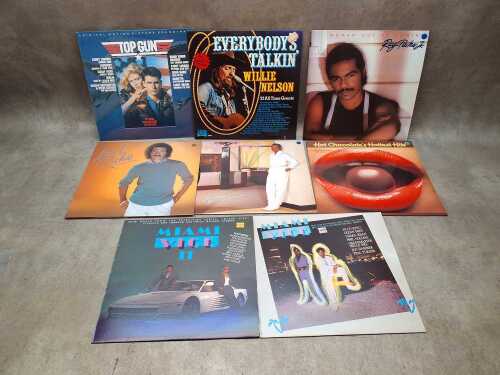 Eight vinyl records, including soundtracks and Pop
