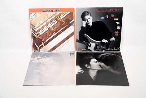 Four Beatles related vinyl records
