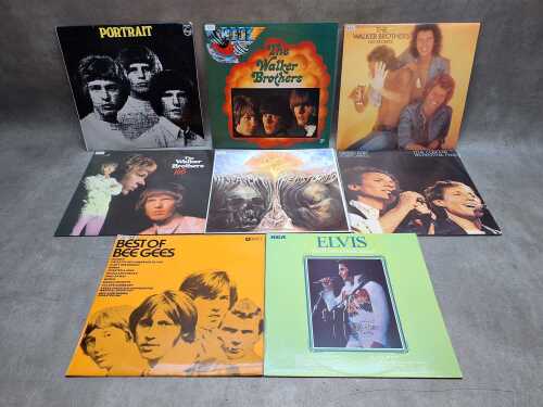 Eight vinyl records