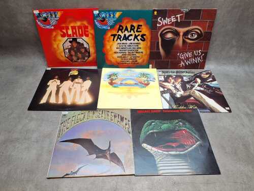 Eight hard rock and glam vinyl records