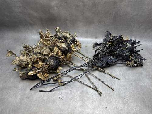 Gothic-style floral decorative stems.