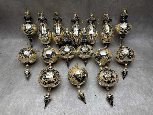 Christmas glass baubles in black and gold tones with glitter accents
