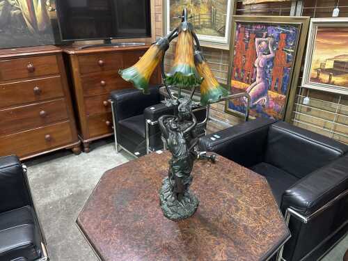 Art Nouveau-style table lamp with green and yellow glass trumpet shades