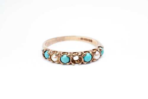 A vintage turquoise and seed pearl ring in 9 carat yellow gold