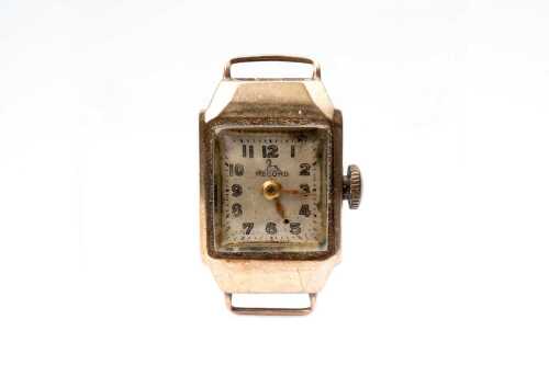 A vintage ladies mechanical watch in 9 carat yellow gold