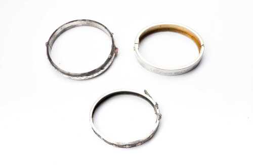 One antique and two vintage bangles in sterling silver