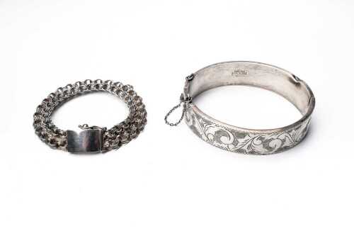A vintage bangle and bracelet in sterling silver