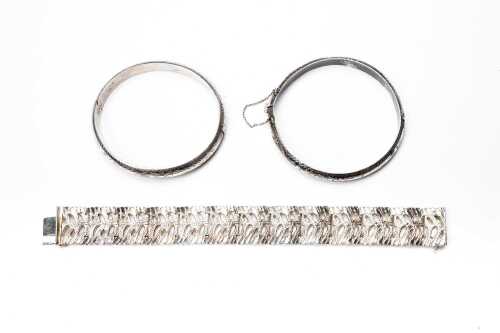 Two vintage bangles and one bracelet in sterling silver.