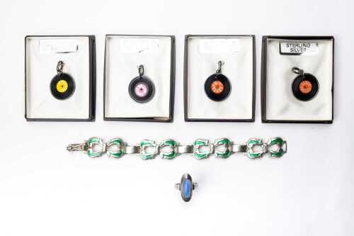 A collection of jewellery in sterling and European silver
