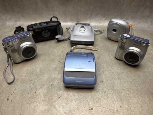 Six instant cameras