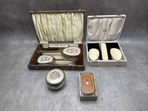 Three vintage dressing table sets