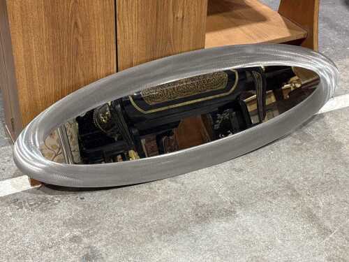Oval shaped mirror