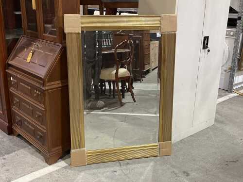 Ornate gilt-effect wall mirror