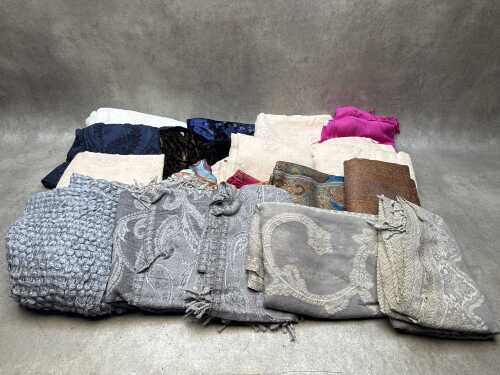 Collection of scarves in various colours and fabrics